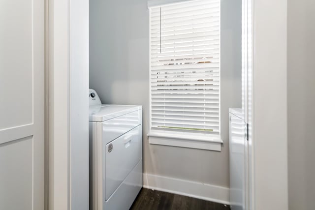 2515 Hanford Ave, Old Hickory, TN 37138 - washroom featuring baseboards, dark wood-type flooring, and independent washer and dryer