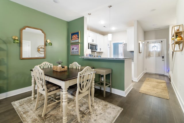 2515 Hanford Ave, Old Hickory, TN 37138 - dining room with baseboards and dark wood-style floors