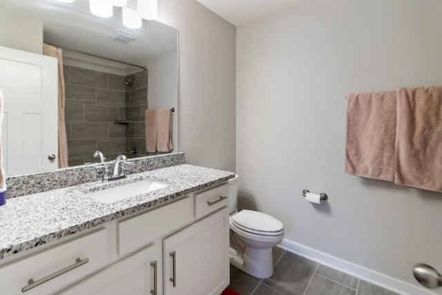 2515 Hanford Ave, Old Hickory, TN 37138 - bathroom with vanity, a shower, toilet, baseboards, and tile patterned floors