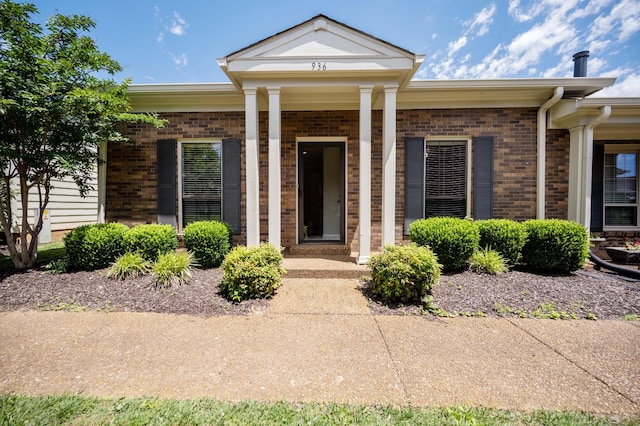 936 E Northfield Blvd, Murfreesboro, TN 37130 - doorway to property with brick siding and a porch