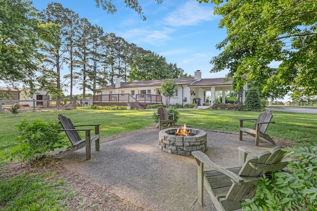 8801 Cedar Grove Rd, Cross Plains, TN 37049 - view of patio with a fire pit and a deck