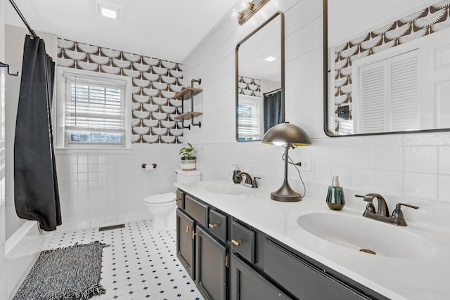 8801 Cedar Grove Rd, Cross Plains, TN 37049 - bathroom featuring tile walls, tile patterned floors, double vanity, toilet, and shower / tub combo with curtain