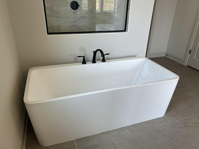 5416 Bridgemore Blvd, Murfreesboro, TN 37129 - bathroom featuring a freestanding bath and tile patterned flooring