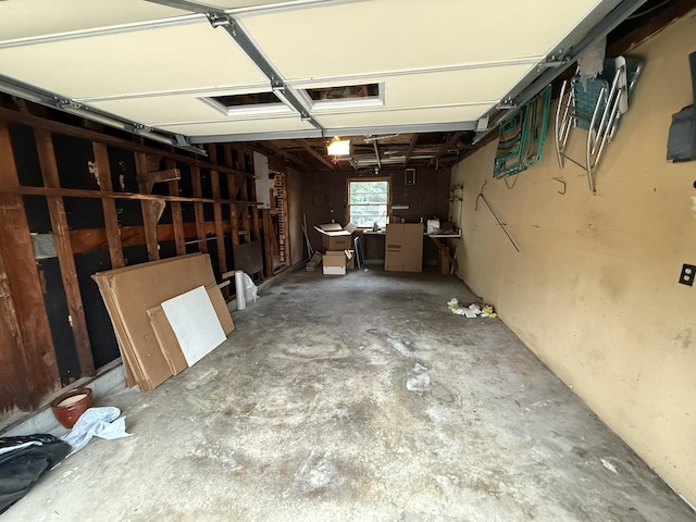563 Ashe Ave, New Johnsonville, TN 37134 - garage with a garage door opener