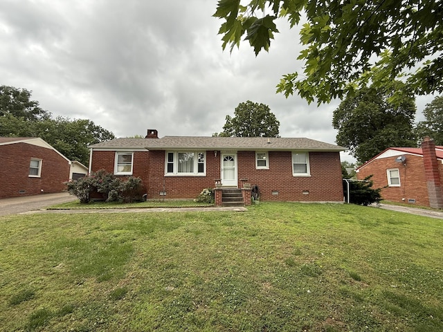 563 Ashe Ave, New Johnsonville, TN 37134 - single story home with brick siding, a front lawn, a chimney, and crawl space