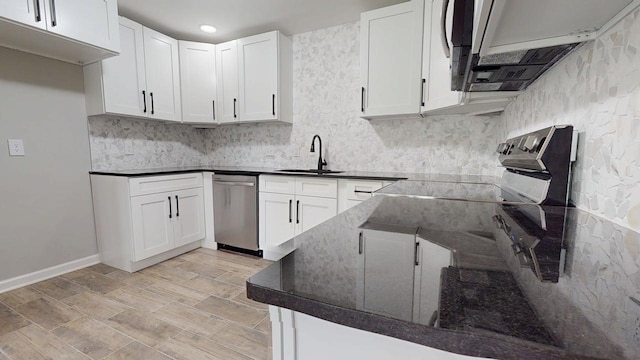 3012 Owendale Dr, Antioch, TN 37013 - kitchen featuring a sink, dishwasher, decorative backsplash, white cabinets, and recessed lighting