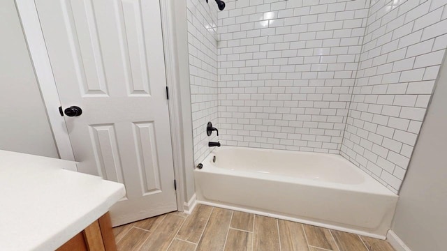 3012 Owendale Dr, Antioch, TN 37013 - full bathroom featuring wood finish floors, baseboards, shower / bath combination, and vanity