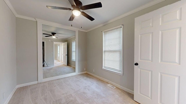 3012 Owendale Dr, Antioch, TN 37013 - empty room featuring light colored carpet, a ceiling fan, ornamental molding, and baseboards