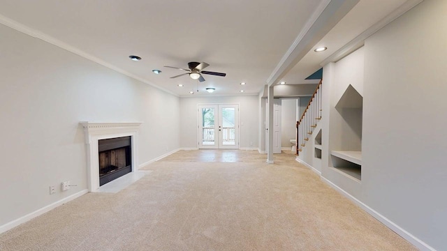 3012 Owendale Dr, Antioch, TN 37013 - unfurnished living room with ornamental molding, built in shelves, carpet floors, a ceiling fan, and baseboards