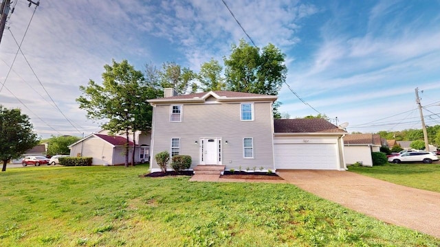 3012 Owendale Dr, Antioch, TN 37013 - colonial home with an attached garage, a chimney, a front yard, and concrete driveway