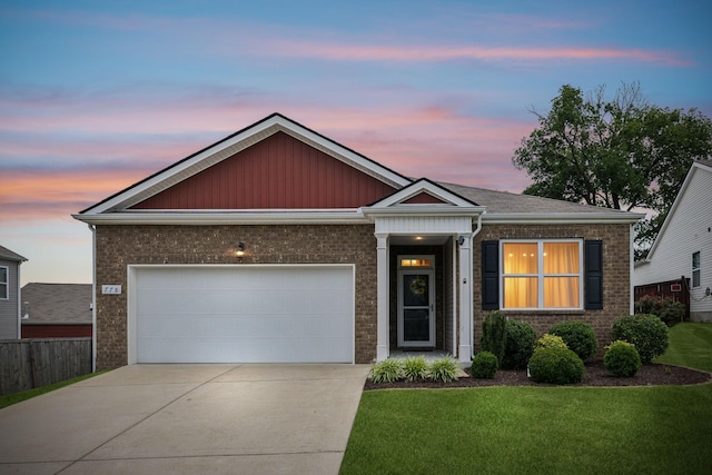 778 Prominence Rd, Columbia, TN 38401 - view of front of home featuring driveway, brick siding, and a garage