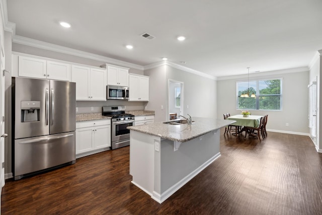 778 Prominence Rd, Columbia, TN 38401 - kitchen with appliances with stainless steel finishes, dark wood-style floors, ornamental molding, white cabinetry, and recessed lighting