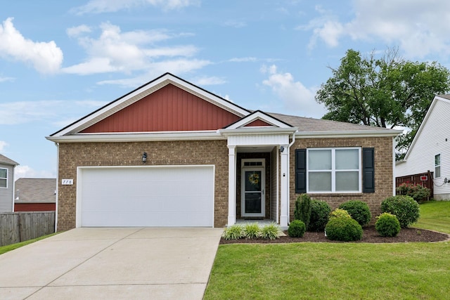 778 Prominence Rd, Columbia, TN 38401 - view of front facade with brick siding, driveway, and an attached garage