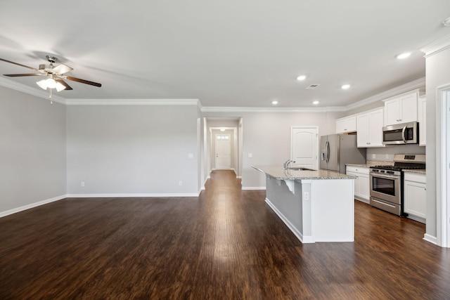 778 Prominence Rd, Columbia, TN 38401 - kitchen featuring stainless steel appliances, a ceiling fan, a kitchen island with sink, dark wood finished floors, and baseboards