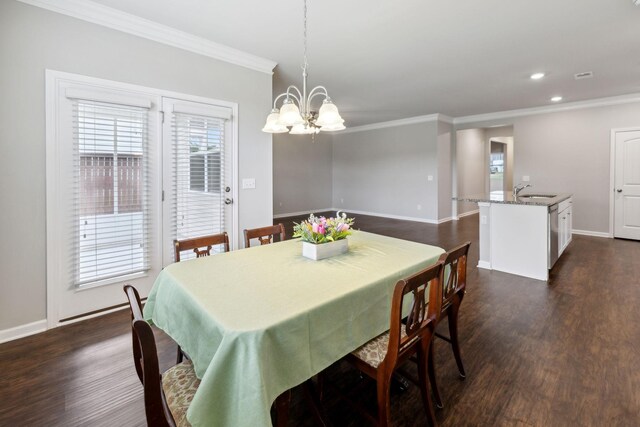 778 Prominence Rd, Columbia, TN 38401 - dining room with crown molding, a chandelier, dark wood finished floors, baseboards, and recessed lighting