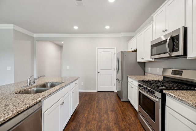 778 Prominence Rd, Columbia, TN 38401 - kitchen with stainless steel appliances, a sink, crown molding, white cabinets, and dark wood-type flooring