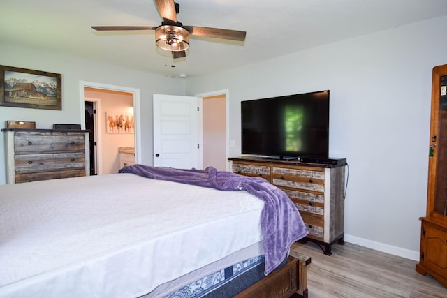 421 Marlin Ln, Westmoreland, TN 37186 - bedroom featuring baseboards, light wood-style flooring, ceiling fan, and connected bathroom