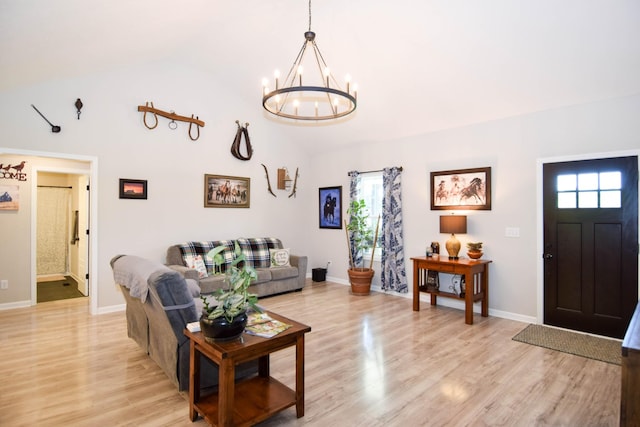 421 Marlin Ln, Westmoreland, TN 37186 - living area with a chandelier, vaulted ceiling, plenty of natural light, light wood-style floors, and baseboards