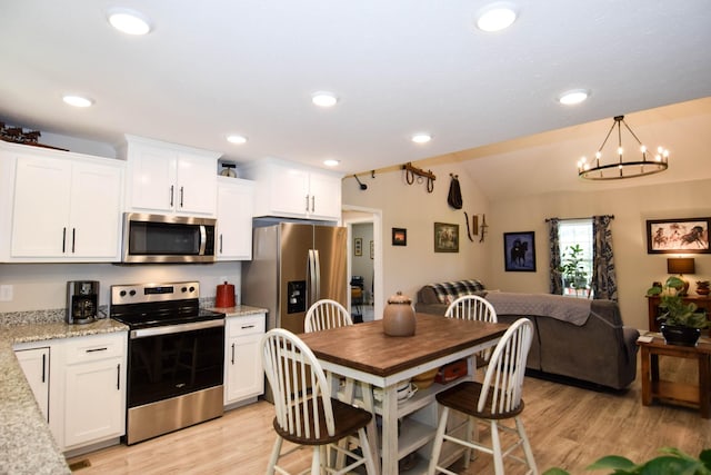 421 Marlin Ln, Westmoreland, TN 37186 - dining area with light wood-style floors, a chandelier, recessed lighting, and lofted ceiling