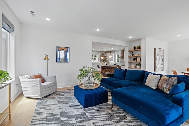 1003 Alice St Unit B, Nashville, TN 37218 - living room featuring light wood-style flooring, recessed lighting, and baseboards