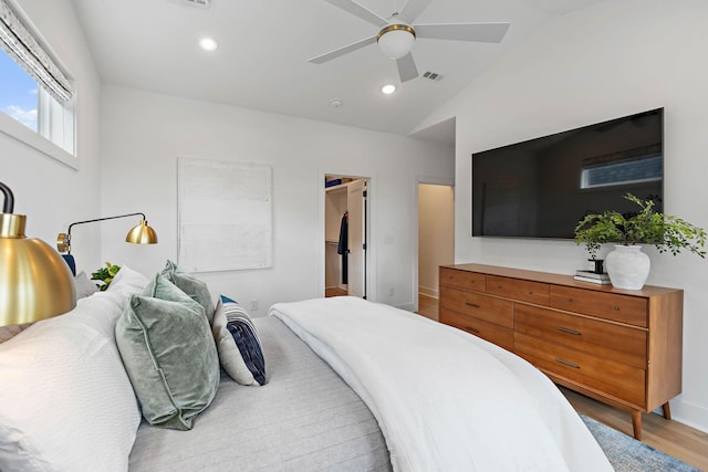 1003 Alice St Unit B, Nashville, TN 37218 - bedroom featuring light wood-style flooring, vaulted ceiling, recessed lighting, a walk in closet, and a ceiling fan