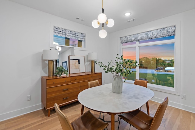 1003 Alice St Unit B, Nashville, TN 37218 - dining room featuring light wood-style floors, baseboards, and healthy amount of natural light