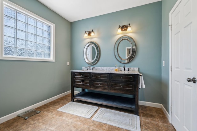 3820 Leona Pass, Hermitage, TN 37076 - full bathroom featuring double vanity, baseboards, and tile patterned flooring