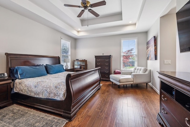 3820 Leona Pass, Hermitage, TN 37076 - bedroom featuring dark wood-type flooring, a raised ceiling, baseboards, a ceiling fan, and recessed lighting