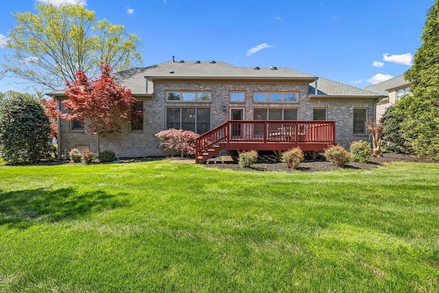 3820 Leona Pass, Hermitage, TN 37076 - back of house featuring a deck, a lawn, and brick siding