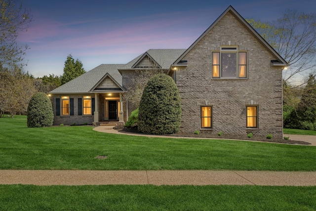 3820 Leona Pass, Hermitage, TN 37076 - view of front of home featuring a lawn and brick siding