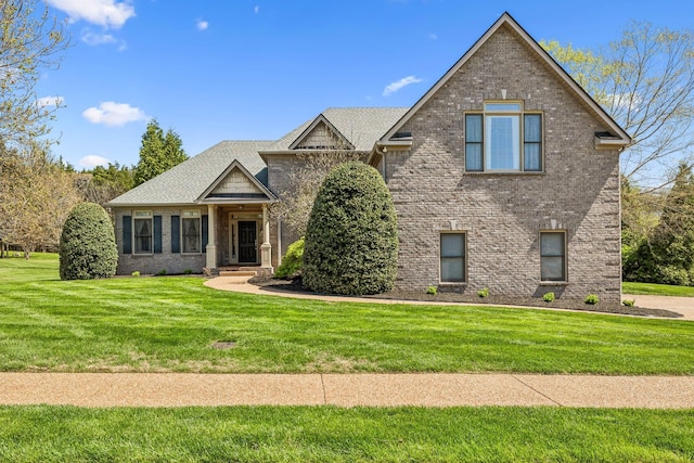 3820 Leona Pass, Hermitage, TN 37076 - view of front of home featuring brick siding and a front lawn