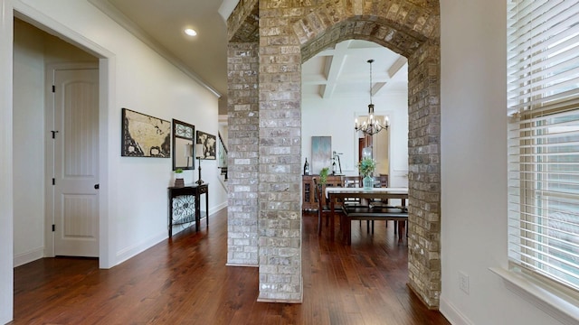 2816 Chatham Place Ct, Thompsons Station, TN 37179 - hallway with ornate columns, a chandelier, coffered ceiling, healthy amount of natural light, and beamed ceiling