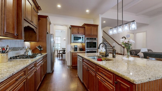 2816 Chatham Place Ct, Thompsons Station, TN 37179 - kitchen with a sink, stainless steel appliances, dark wood-style floors, ornamental molding, and light stone counters