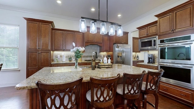 2816 Chatham Place Ct, Thompsons Station, TN 37179 - kitchen with appliances with stainless steel finishes, an island with sink, backsplash, dark wood-type flooring, and recessed lighting