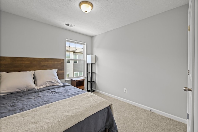 305 Jerry Butler Dr, La Vergne, TN 37086 - carpeted bedroom featuring baseboards and a textured ceiling