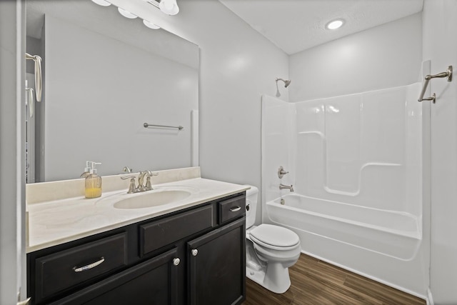 305 Jerry Butler Dr, La Vergne, TN 37086 - full bath with vanity, wood finished floors, toilet, and washtub / shower combination