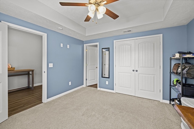 305 Jerry Butler Dr, La Vergne, TN 37086 - bedroom featuring carpet, baseboards, a raised ceiling, a closet, and ceiling fan