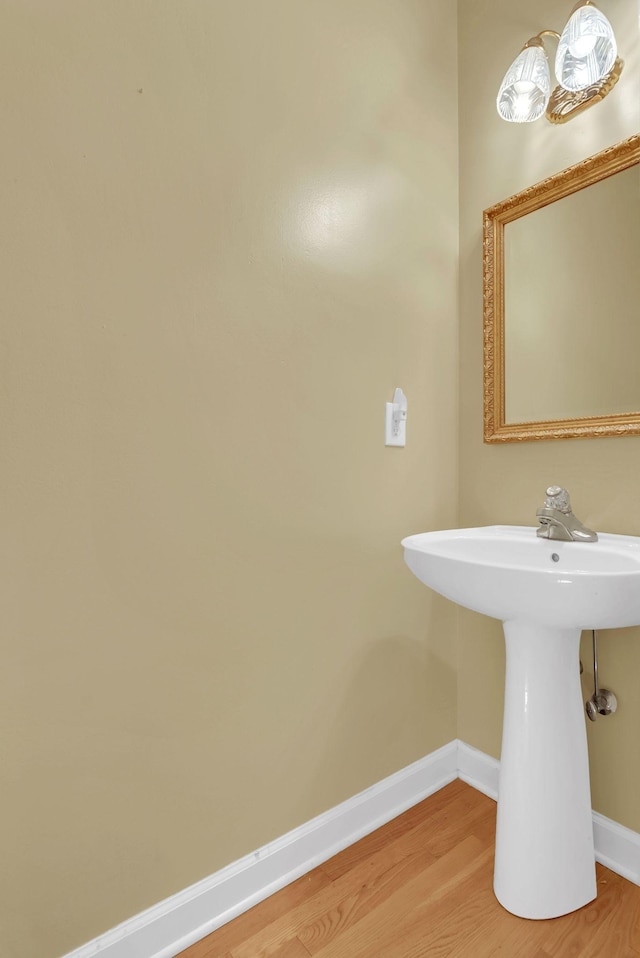 411 Royal Xing, Franklin, TN 37064 - bathroom with baseboards, wood finished floors, and a sink