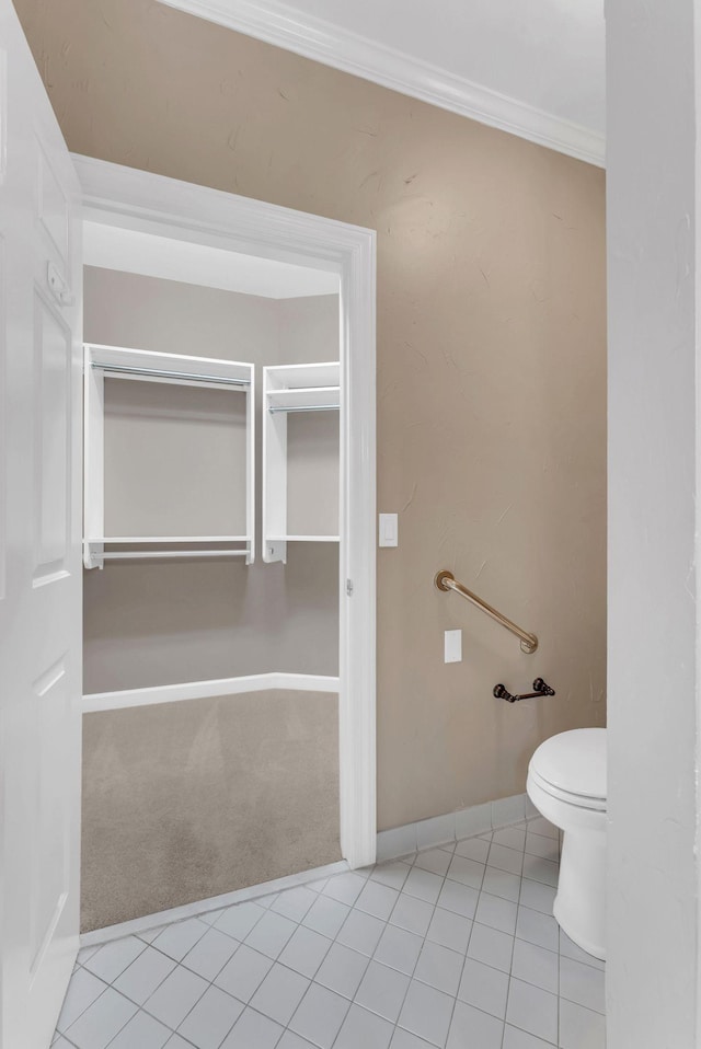 411 Royal Xing, Franklin, TN 37064 - bathroom with toilet, crown molding, tile patterned flooring, and baseboards