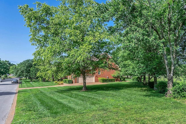 411 Royal Xing, Franklin, TN 37064 - view of grassy yard with a garage