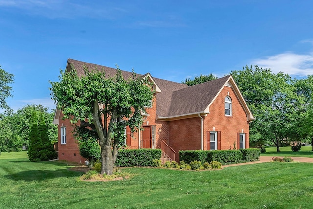 411 Royal Xing, Franklin, TN 37064 - view of front of property featuring brick siding, a front yard, and roof with shingles