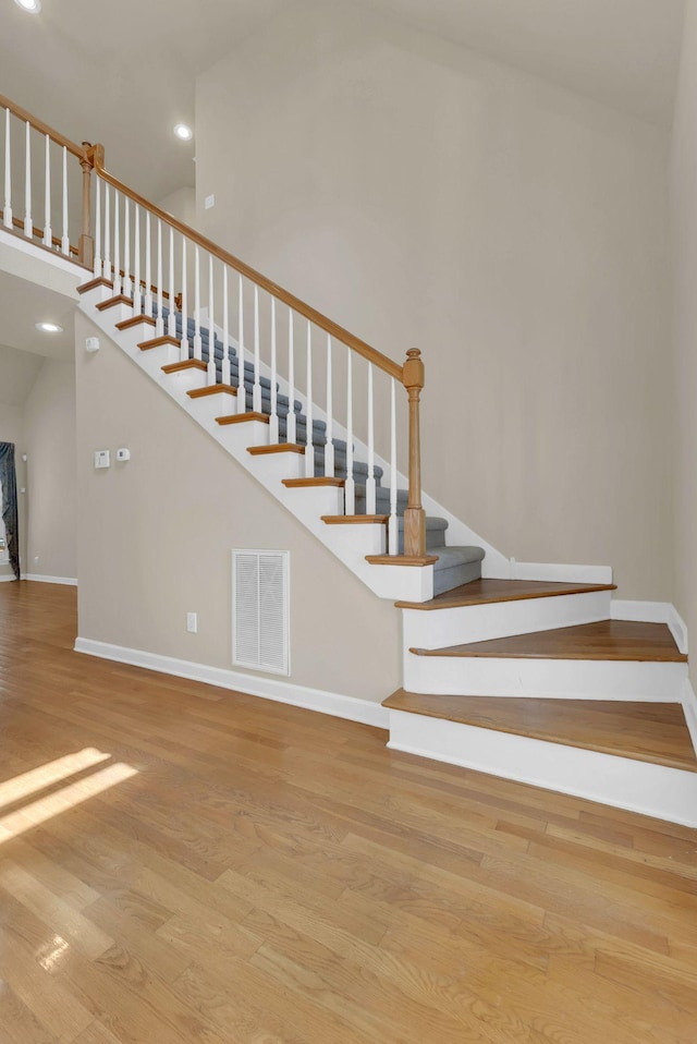 411 Royal Xing, Franklin, TN 37064 - staircase featuring wood finished floors, baseboards, and recessed lighting