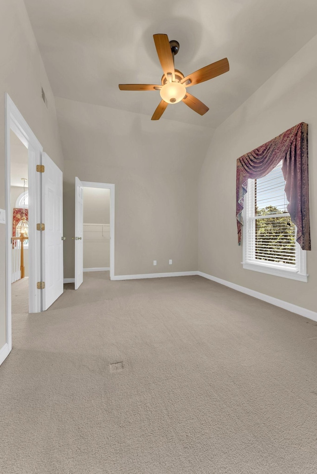 411 Royal Xing, Franklin, TN 37064 - empty room featuring a ceiling fan, carpet flooring, baseboards, and vaulted ceiling