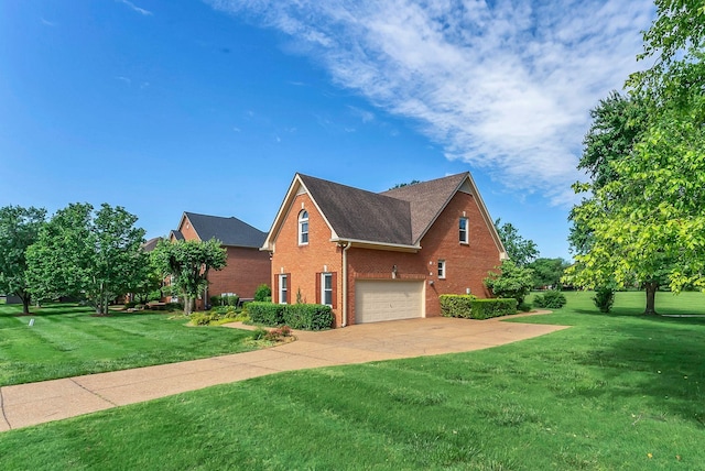 411 Royal Xing, Franklin, TN 37064 - view of side of home featuring brick siding, a garage, a lawn, and driveway