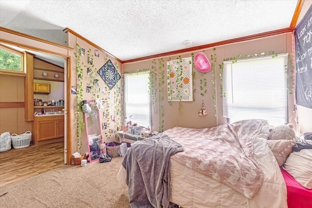 0 Ez Ln, Manchester, TN 37355 - bedroom featuring ornamental molding, a textured ceiling, a sink, carpet floors, and wallpapered walls