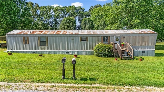 0 Ez Ln, Manchester, TN 37355 - manufactured / mobile home with a front lawn