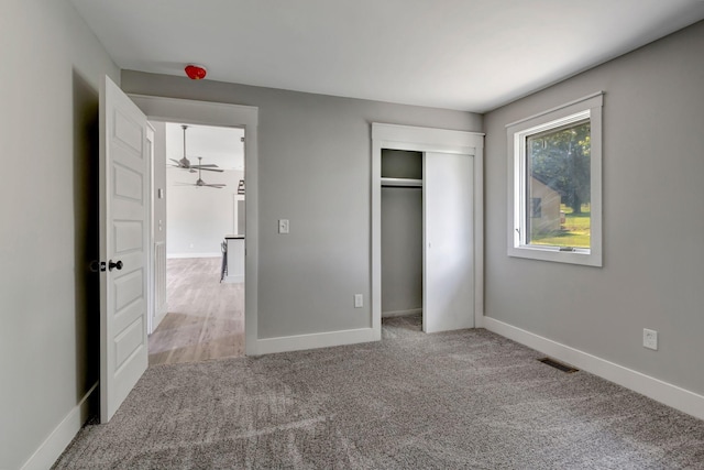 120 E Boiling Springs Rd E, Portland, TN 37148 - unfurnished bedroom with carpet flooring, a closet, and baseboards