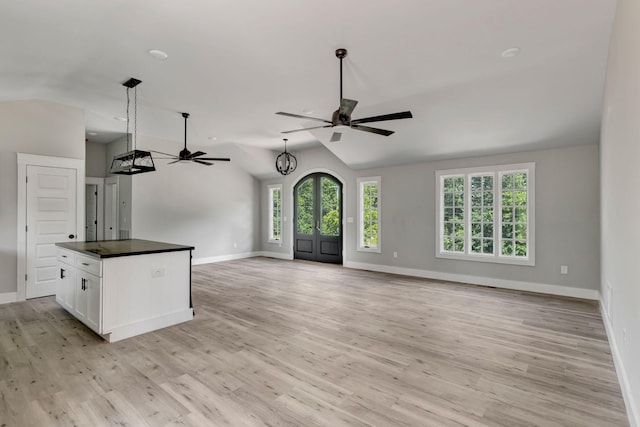120 E Boiling Springs Rd E, Portland, TN 37148 - unfurnished living room featuring lofted ceiling, a ceiling fan, baseboards, and light wood-style flooring