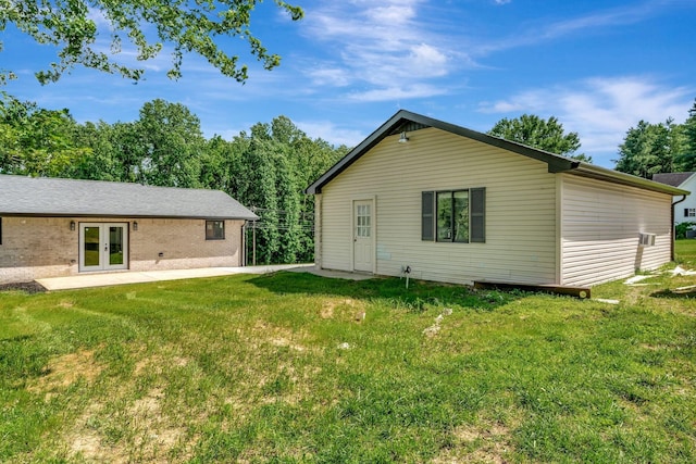 120 E Boiling Springs Rd E, Portland, TN 37148 - back of property with french doors, a yard, and a patio