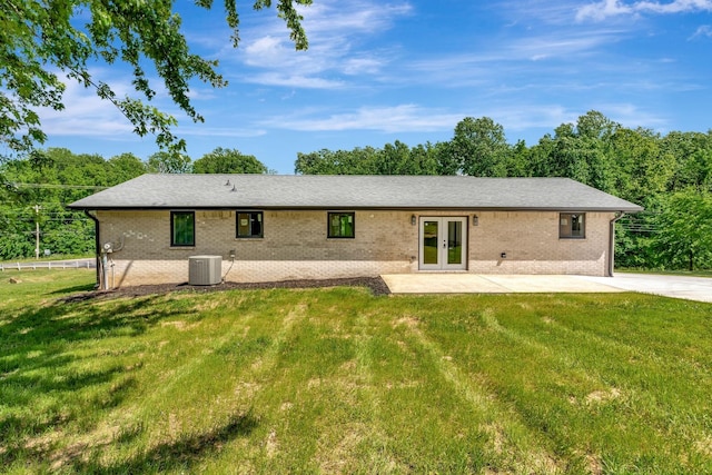 120 E Boiling Springs Rd E, Portland, TN 37148 - rear view of property with french doors, brick siding, a yard, central AC, and a patio